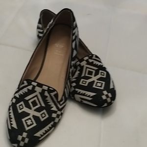 Ladies black and white loafers